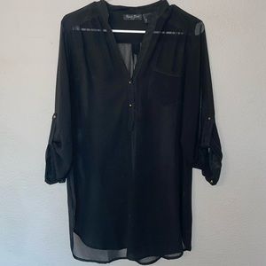 Black blouse with brass buttons